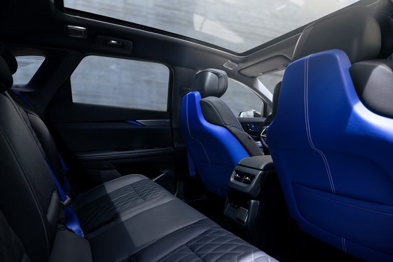 Back Seat View of the 2026 OPTIQ-V Blue Front Seats, Sun Roof, and Interior | Wackerli Cadillac of Idaho Falls in Idaho falls ID